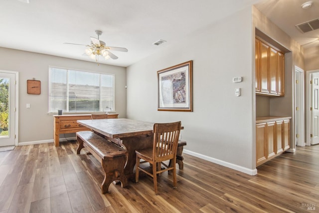 670 Turnberry Ter, Rio Vista, CA 94571 - dining room featuring dark wood-type flooring, ceiling fan, and baseboards