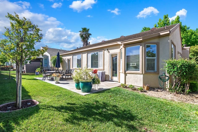 670 Turnberry Ter, Rio Vista, CA 94571 - rear view of property with stucco siding and a patio area