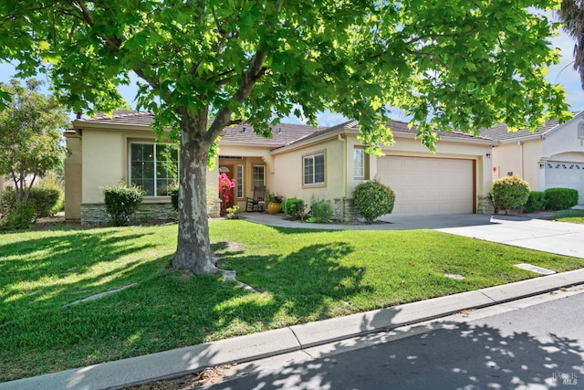 670 Turnberry Ter, Rio Vista, CA 94571 - view of front of home with stucco siding, stone siding, a garage, and concrete driveway