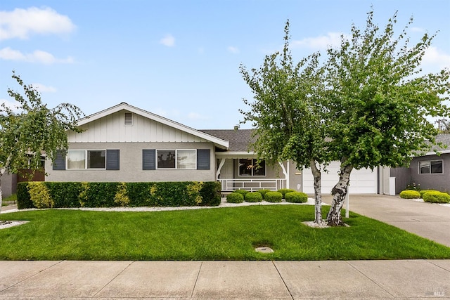 607 Tobin Dr, Vallejo, CA 94589 - view of front facade featuring concrete driveway, a front lawn, an attached garage, and covered porch