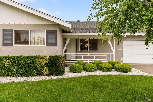 607 Tobin Dr, Vallejo, CA 94589 - view of front facade featuring a front lawn, a shingled roof, covered porch, a garage, and concrete driveway