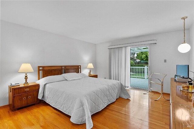 607 Tobin Dr, Vallejo, CA 94589 - bedroom featuring access to outside, light wood-style flooring, and baseboards
