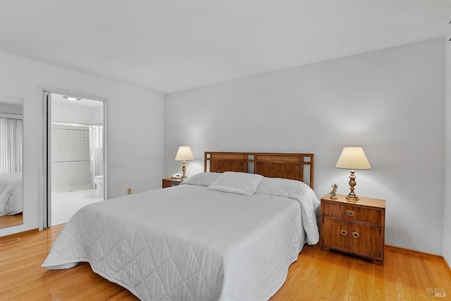607 Tobin Dr, Vallejo, CA 94589 - bedroom featuring light wood-style floors and connected bathroom