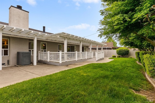 607 Tobin Dr, Vallejo, CA 94589 - back of property with central air condition unit, a pergola, stucco siding, a chimney, and a patio