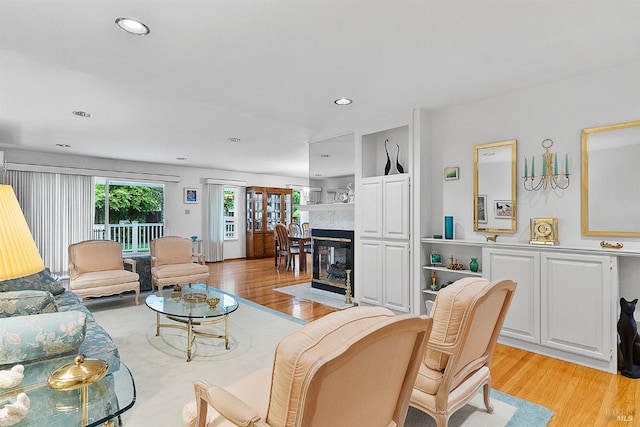 607 Tobin Dr, Vallejo, CA 94589 - living area with light wood-style flooring, a fireplace, and recessed lighting