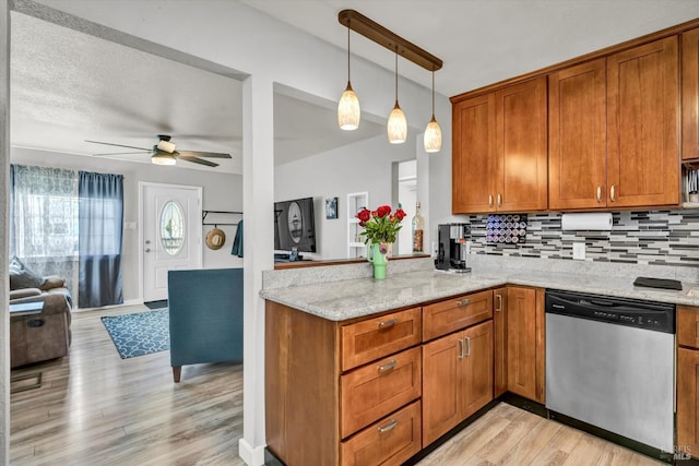 2298 Janette Dr, Napa, CA 94558 - kitchen featuring dishwasher, ceiling fan, open floor plan, and brown cabinetry