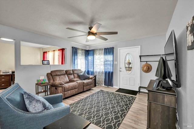 2298 Janette Dr, Napa, CA 94558 - living area featuring ceiling fan, a textured ceiling, and light wood-style floors