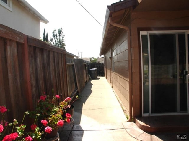 1994 Cardinal Way, Fairfield, CA 94533 - view of side of home featuring fence and a patio