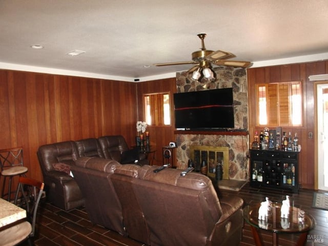 1994 Cardinal Way, Fairfield, CA 94533 - living room with a fireplace, ceiling fan, wooden walls, and wood finished floors