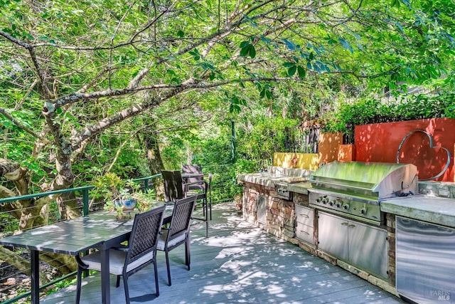 3371 Crystal Ct, Napa, CA 94558 - view of patio with area for grilling, a wooden deck, outdoor dining area, and an outdoor kitchen