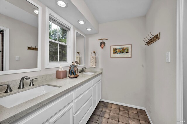 3371 Crystal Ct, Napa, CA 94558 - bathroom featuring baseboards, double vanity, tile patterned floors, and recessed lighting