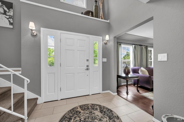 3371 Crystal Ct, Napa, CA 94558 - entrance foyer featuring tile patterned flooring, stairway, a textured wall, and baseboards