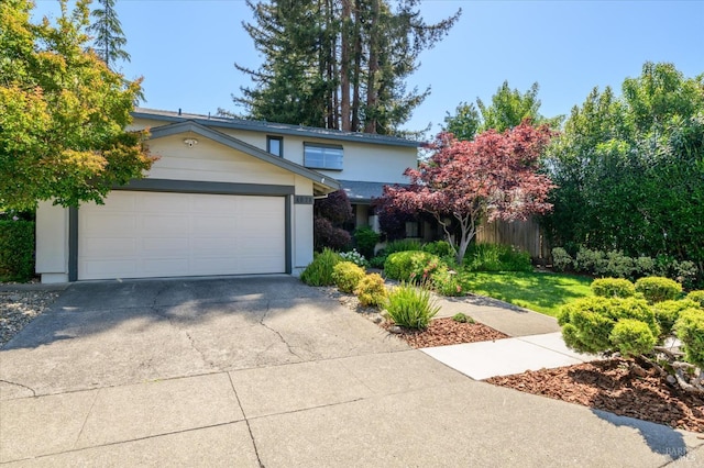 4078 Tokay Dr, Napa, CA 94558 - view of front of home with driveway, an attached garage, and stucco siding