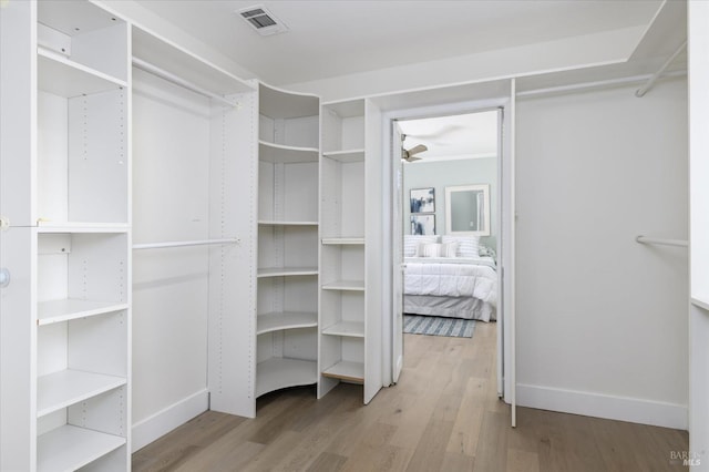 4078 Tokay Dr, Napa, CA 94558 - walk in closet featuring wood finished floors and ceiling fan