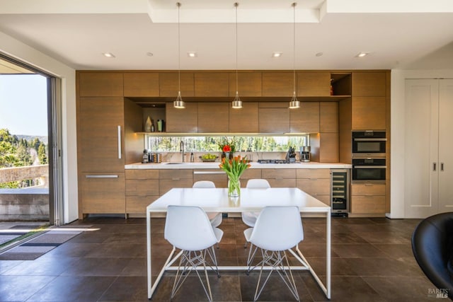 8909 Mill Creek Rd, Healdsburg, CA 95448 - kitchen featuring brown cabinetry, modern cabinets, wine cooler, and recessed lighting