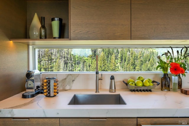 8909 Mill Creek Rd, Healdsburg, CA 95448 - kitchen view of a sink and light stone counters