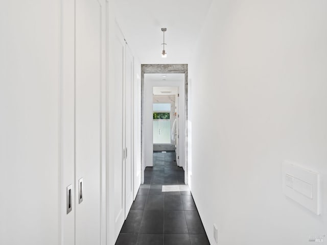 8909 Mill Creek Rd, Healdsburg, CA 95448 - hallway with dark tile patterned floors