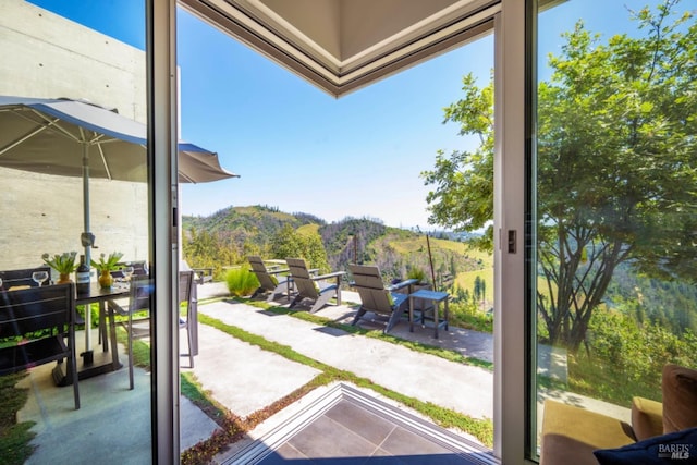 8909 Mill Creek Rd, Healdsburg, CA 95448 - doorway to outside featuring a mountain view and plenty of natural light