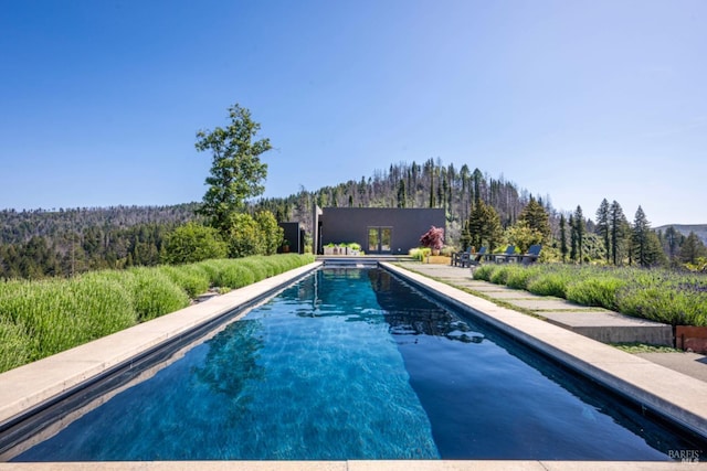 8909 Mill Creek Rd, Healdsburg, CA 95448 - outdoor pool featuring a view of trees and a mountain view
