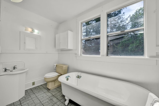 1466 Cooper Rd, Sebastopol, CA 95472 - full bath with toilet, a freestanding tub, and baseboards