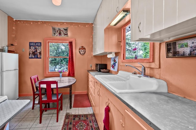 1466 Cooper Rd, Sebastopol, CA 95472 - kitchen featuring freestanding refrigerator, a sink, and light countertops