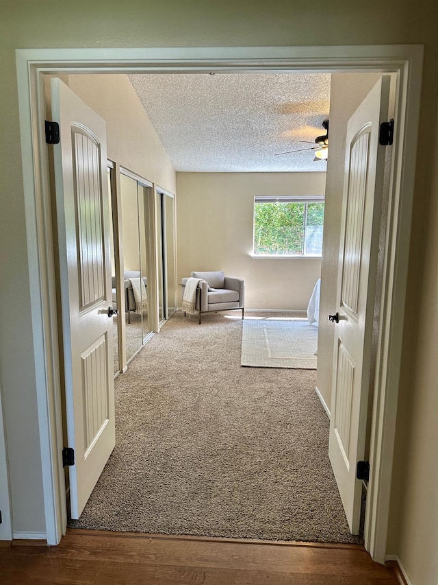 3 Clemson Ct, Woodland, CA 95695 - bedroom featuring carpet flooring, a textured ceiling, multiple closets, and baseboards
