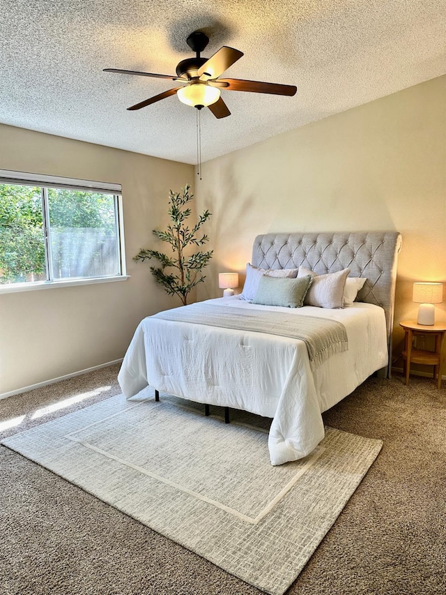 3 Clemson Ct, Woodland, CA 95695 - carpeted bedroom with a textured ceiling and a ceiling fan
