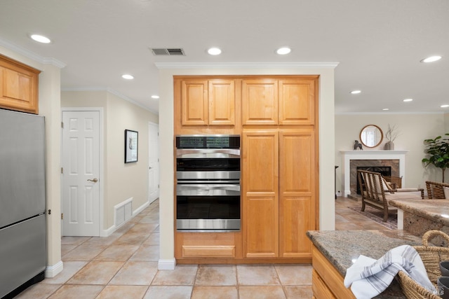 6 Tyler St, Novato, CA 94947 - kitchen with appliances with stainless steel finishes, recessed lighting, ornamental molding, baseboards, and light stone countertops