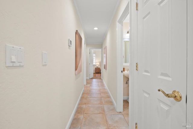 6 Tyler St, Novato, CA 94947 - hallway featuring light tile patterned flooring, crown molding, and baseboards