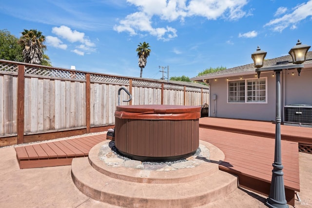 6 Tyler St, Novato, CA 94947 - wooden terrace with a hot tub, fence, and central AC