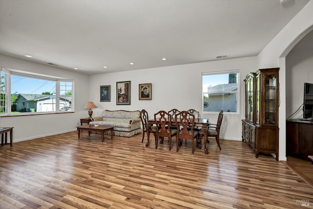 17962 Bunker Rd, Hidden Valley Lake, CA 95467 - dining area with light wood-type flooring, baseboards, arched walkways, and recessed lighting