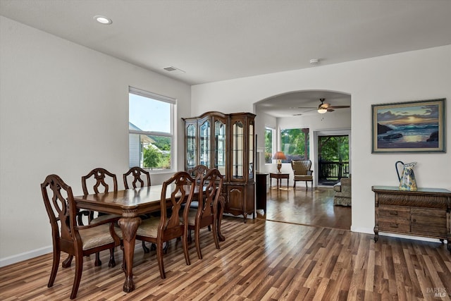 17962 Bunker Rd, Hidden Valley Lake, CA 95467 - dining space with arched walkways, wood finished floors, ceiling fan, recessed lighting, and baseboards