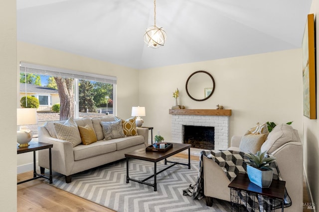 8017 Washington Ave, Sebastopol, CA 95472 - living room with wood finished floors, vaulted ceiling, and a fireplace