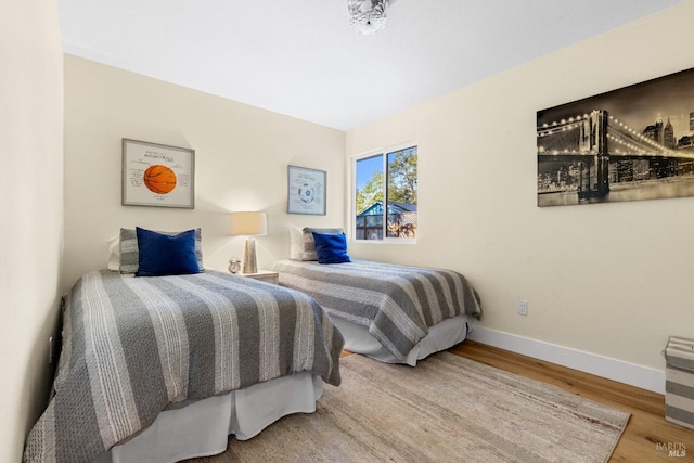8017 Washington Ave, Sebastopol, CA 95472 - bedroom featuring wood finished floors and baseboards