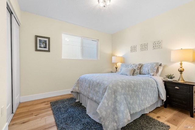 8017 Washington Ave, Sebastopol, CA 95472 - bedroom with light wood-type flooring, baseboards, and a closet