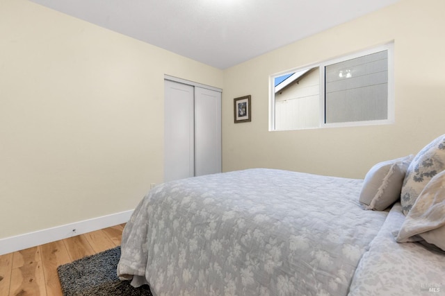8017 Washington Ave, Sebastopol, CA 95472 - bedroom with wood finished floors, baseboards, and a closet