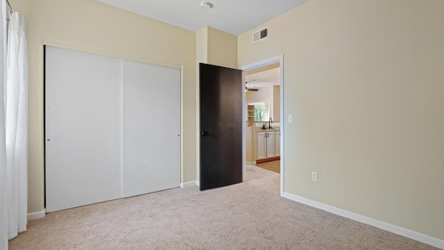 4200 E Commerce Way Unit 1324, Sacramento, CA 95834 - unfurnished bedroom with carpet floors, a closet, and baseboards