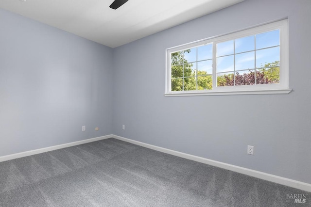 2835 Owens St, Fairfield, CA 94534 - spare room with dark colored carpet, baseboards, and a ceiling fan