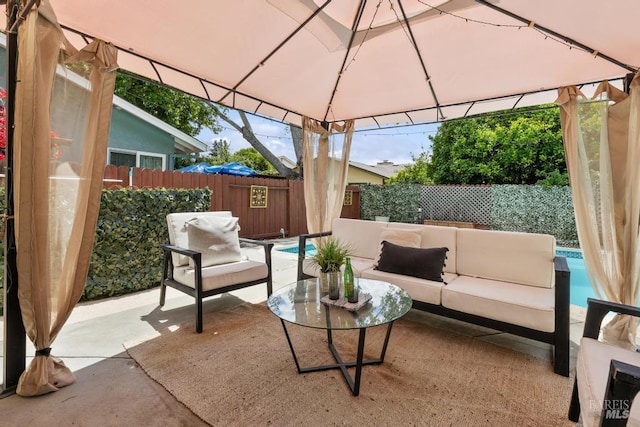 2835 Owens St, Fairfield, CA 94534 - view of patio / terrace with an outdoor living space, a gazebo, and a fenced backyard