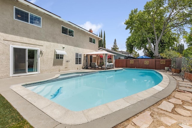 2835 Owens St, Fairfield, CA 94534 - view of pool featuring a gazebo, a fenced backyard, a patio, and a pool with connected hot tub