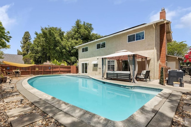 2835 Owens St, Fairfield, CA 94534 - view of pool featuring a gazebo, a patio, outdoor lounge area, and a fenced backyard