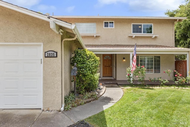 2835 Owens St, Fairfield, CA 94534 - view of front of home featuring stucco siding, an attached garage, and a front yard