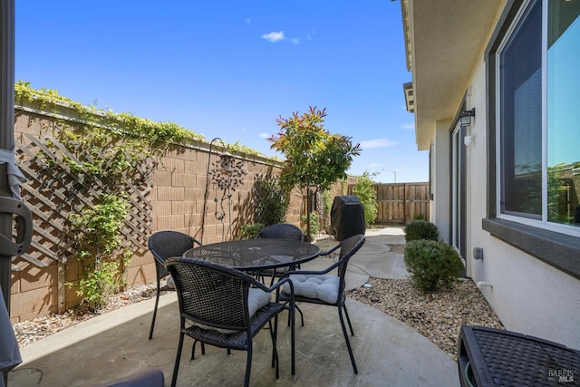 2056 Parsons Dr, Fairfield, CA 94533 - view of patio featuring a fenced backyard and outdoor dining area