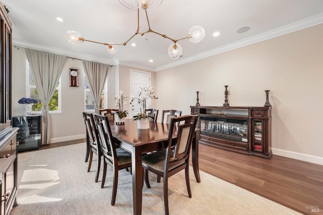 2056 Parsons Dr, Fairfield, CA 94533 - dining area with ornamental molding, baseboards, light wood-type flooring, recessed lighting, and a chandelier