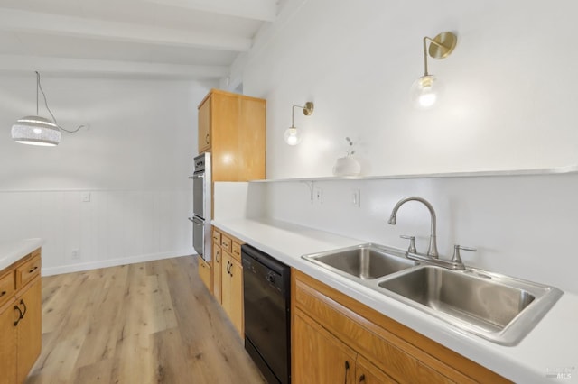 2889 Keller Ct, Napa, CA 94558 - kitchen featuring black dishwasher, a sink, light wood-style flooring, a wainscoted wall, and light countertops