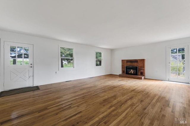 2951 Thorn Rd, Sebastopol, CA 95472 - unfurnished living room with plenty of natural light, wood finished floors, and a fireplace
