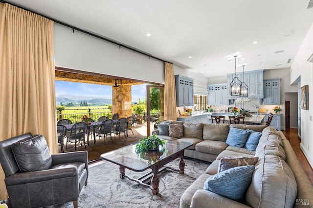 7035 Silverado Trl, Napa, CA 94558 - living room with a chandelier, recessed lighting, and a mountain view