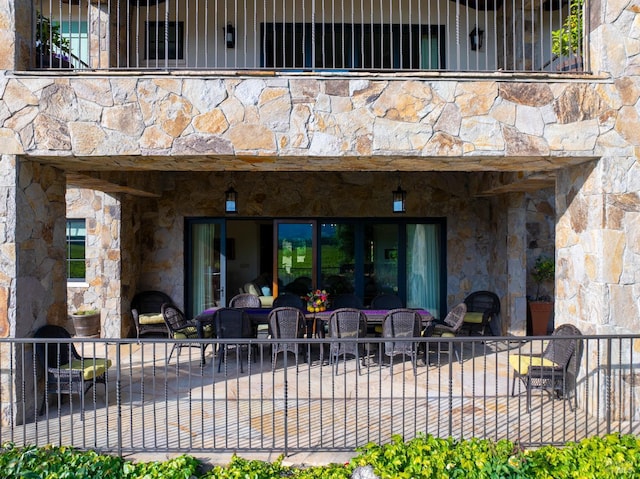 7035 Silverado Trl, Napa, CA 94558 - rear view of property with stone siding and a patio
