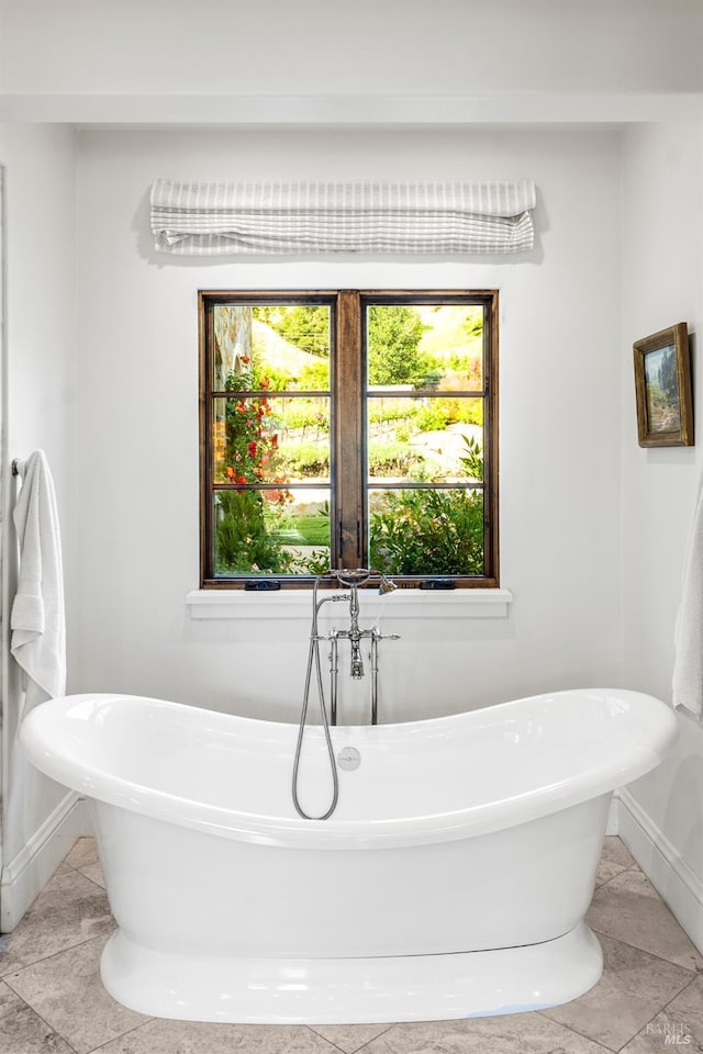 7035 Silverado Trl, Napa, CA 94558 - full bathroom with baseboards and a freestanding tub
