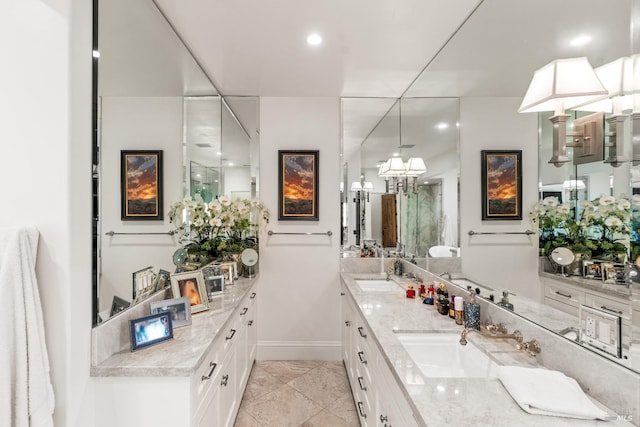 7035 Silverado Trl, Napa, CA 94558 - bathroom featuring double vanity, a chandelier, baseboards, a shower, and recessed lighting
